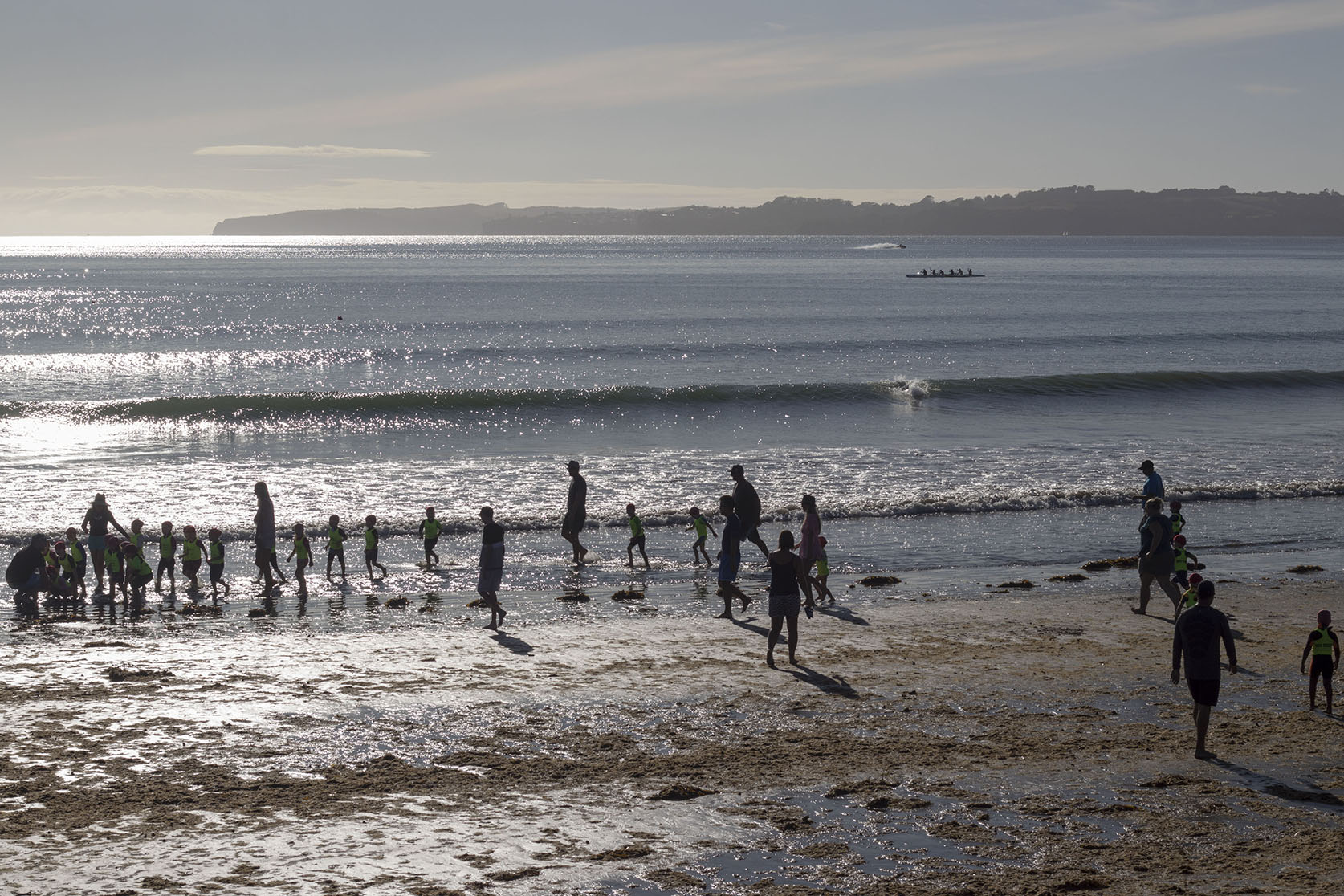 Men paddling at the beach